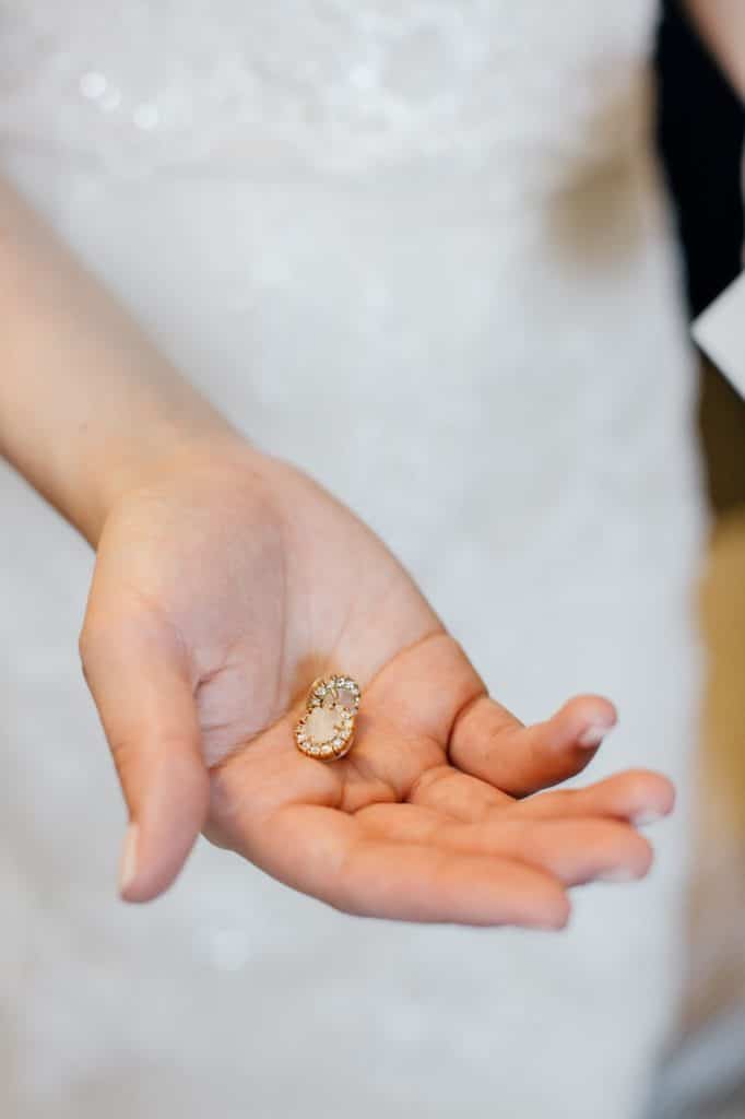 Tiffanys mothers earrings Alisa Tongg Celebrant Race Street Peir Philadelphia wedding Emily Wren Photography