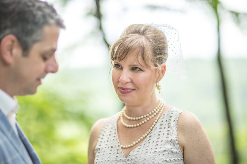 Nate vows Alisa Tongg Celebrant Family Vow Renewal at The Living Wall at Promise Ridge Jeremie Barlow Photography