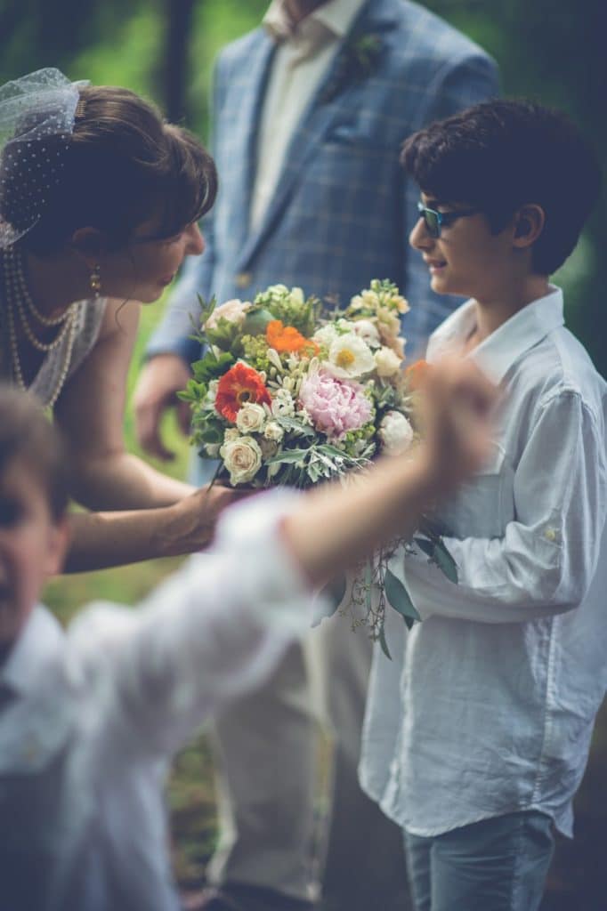 Not so still family Alisa Tongg Celebrant Family Vow Renewal at The Living Wall at Promise Ridge Jeremie Barlow Photography