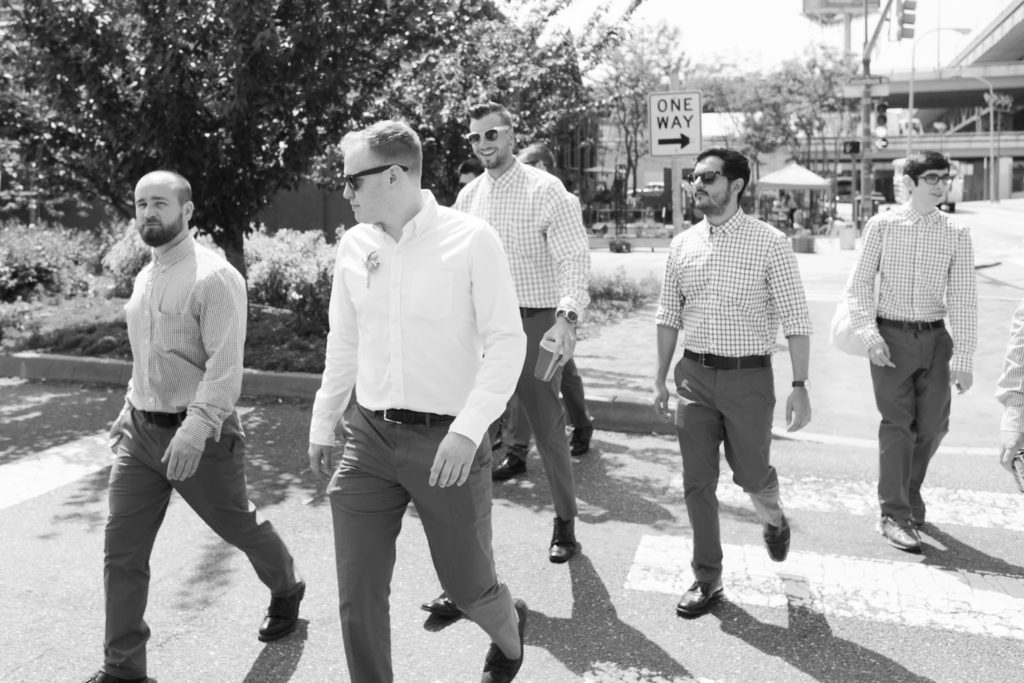 dustin and the groomsmen arrive alisa tongg celebrant race street peir philadelphia wedding emily wren photography