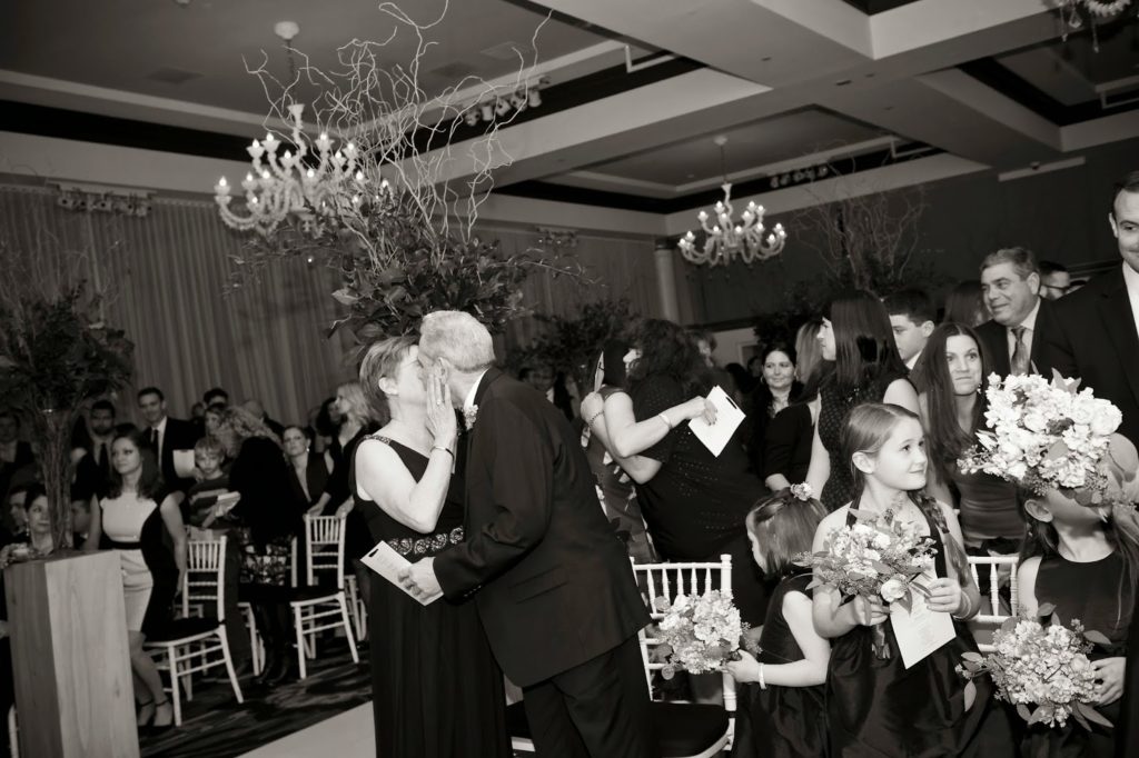 passing the sign of peace for carly branden alisa tongg celebrant heather fowler photography