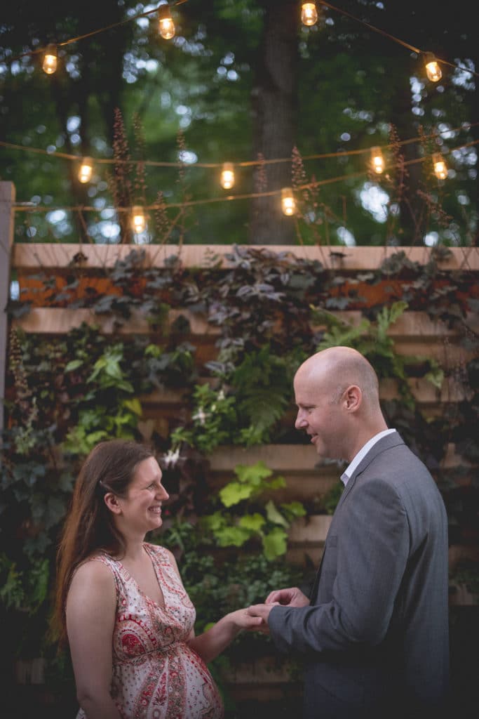 ring exchange Blue Hour Elopement at The Living wall at Promise Ridge Rob Yaskovic Photography